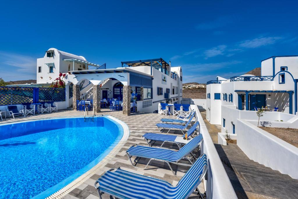 View of the hotel and nearby beach atmosphere in Perivolos